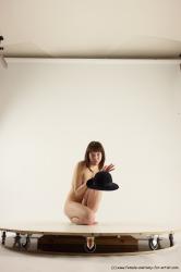 Nude Woman White Sitting poses - ALL Slim medium brown Sitting poses - on knees Multi angle poses Pinup
